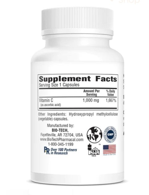 The supplement facts on the back of a white bottle of vitamin C pills