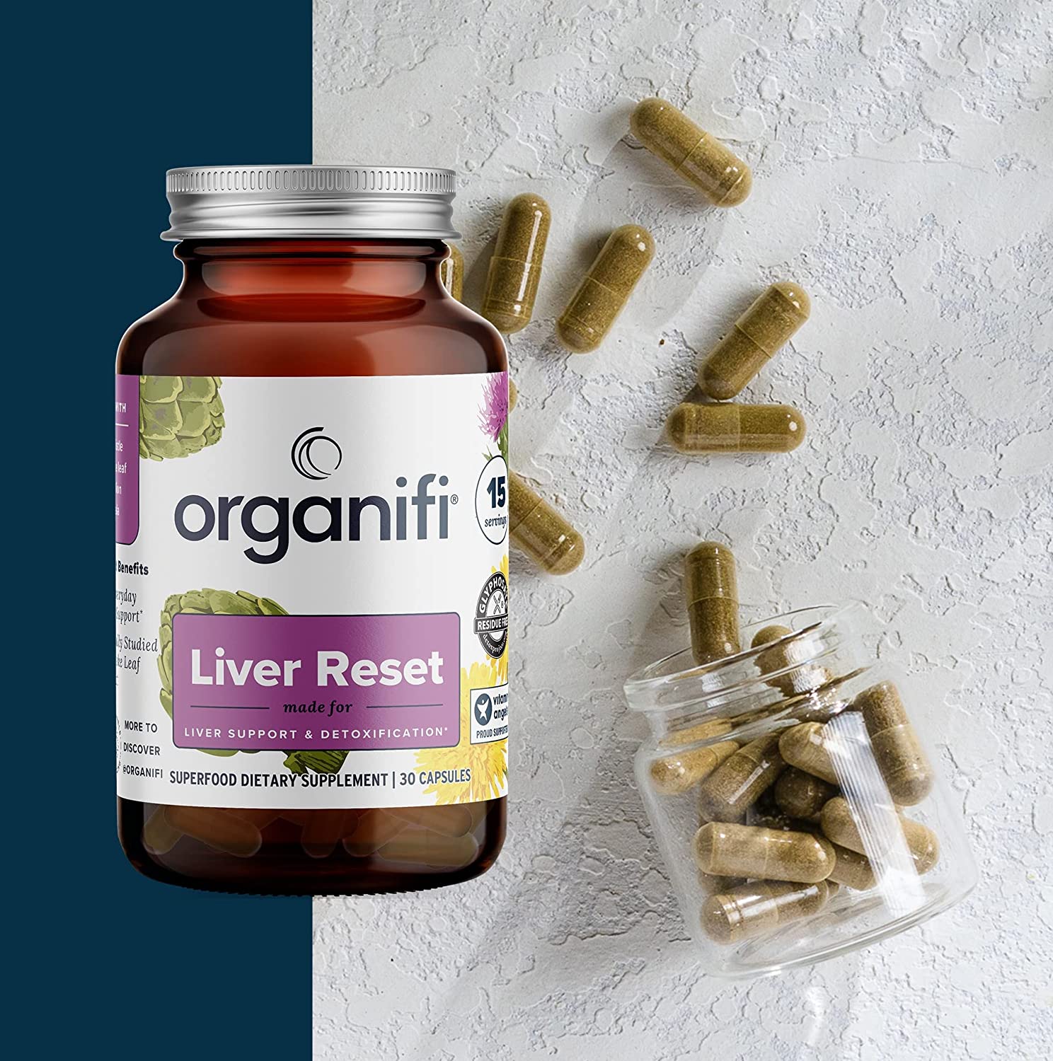 a bottle of Organifi Liver Reset with pills scattered next to it